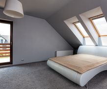 Urban apartment - modern bedroom on the attic